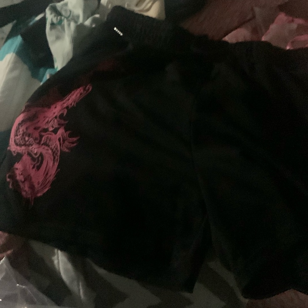 Too big large in size black sweat pant shorts very cute